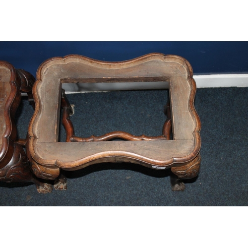 450 - Pair of antique mahogany shaped footstools raised on cabriole supports, terminating on ball and claw... 