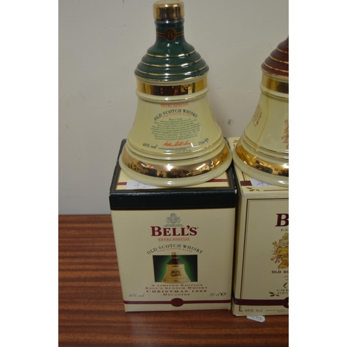 42 - Four Bell's whisky christmas decanters with contents, 1993, 1996, 1997, 1998, 70cl, 40% vol, boxed, ... 