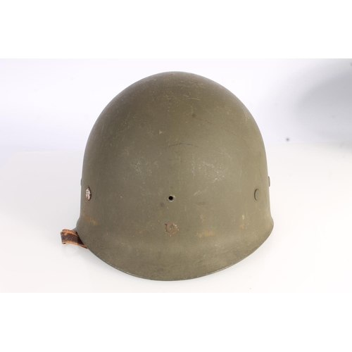 1895 - American WWII style steel helmet with painted decoration in the form of two white spades suggesting ... 