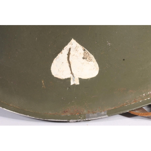 1895 - American WWII style steel helmet with painted decoration in the form of two white spades suggesting ... 