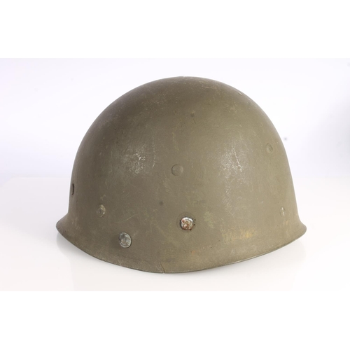 1895 - American WWII style steel helmet with painted decoration in the form of two white spades suggesting ... 