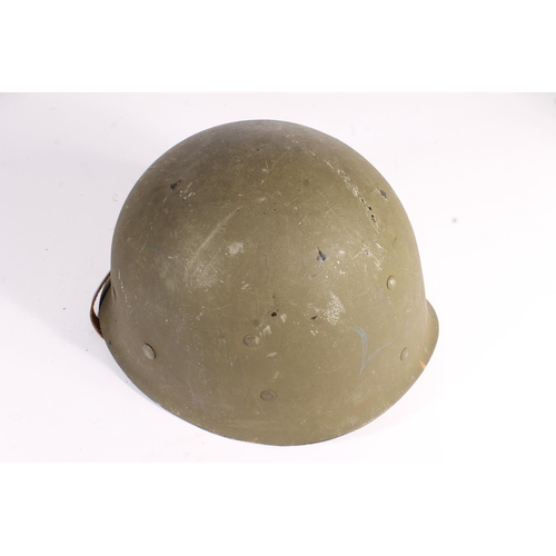 1896 - American M1 style helmet having camouflage cover and netting, Capac liner, with leather headband and... 