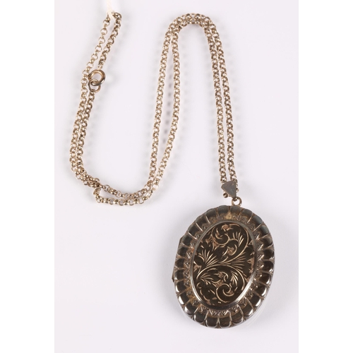 63 - Large silver locket on chain, 34.6g