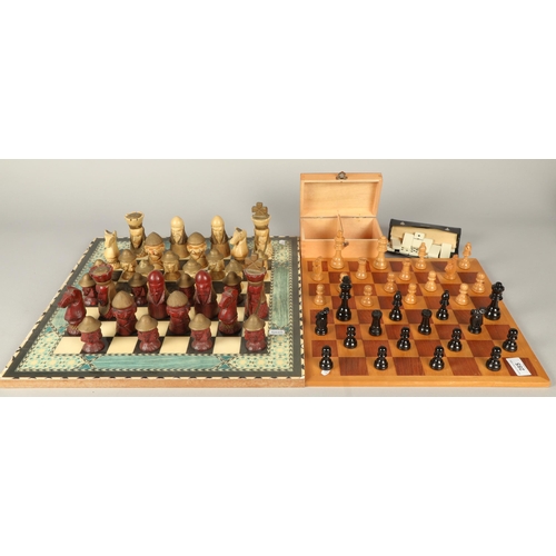 634 - Two chess sets with boards & dominoes