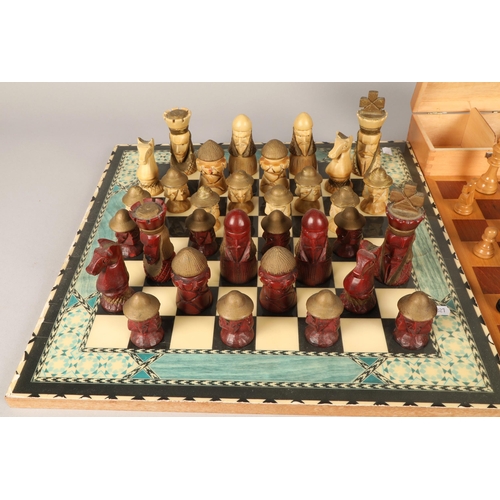 634 - Two chess sets with boards & dominoes