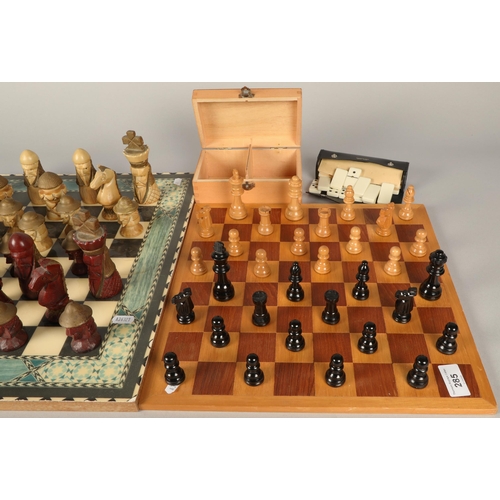 634 - Two chess sets with boards & dominoes