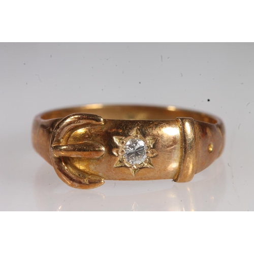 700 - Diamond set yellow metal ring in the form of a belt, possibly stamped 18ct.