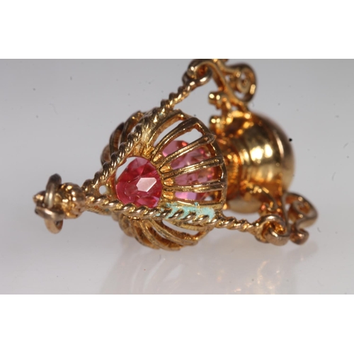 710 - 9ct gold pink stone set pendant in the form of a lantern, 4.9g.