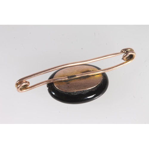 725 - 9ct gold mourning brooch set with pearl, another Victorian mourning brooch, and a 9ct gold stick pin... 