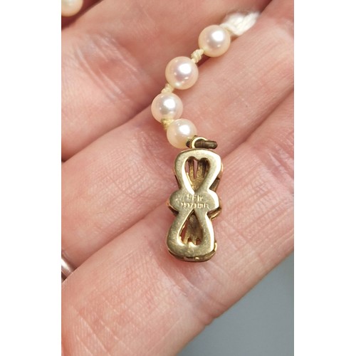 60A - String of pearls on 9ct gold clasp,