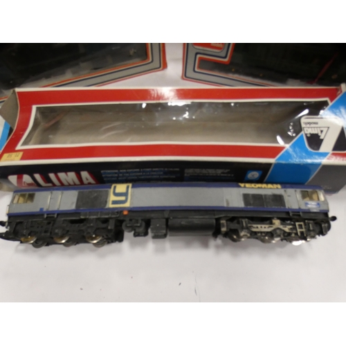 21 - Carton containing boxed Lima OO gauge models to include Class 37 'Loch Rannoch' diesel loco, two Cla... 