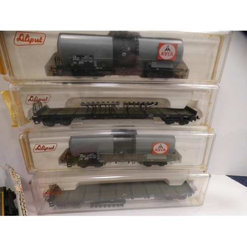 22 - Carton containing boxed Liliput wagons, Hornby Dublo Pullman coaches etc.