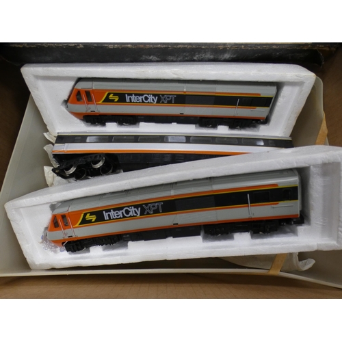 45 - Two cartons containing model railway accessories to include OO gauge Intercity XPT train packs, cont... 