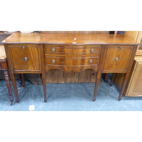 475 - Reproduction mahogany and crossbanded serpentine front sideboard, on reeded square tapering supports... 