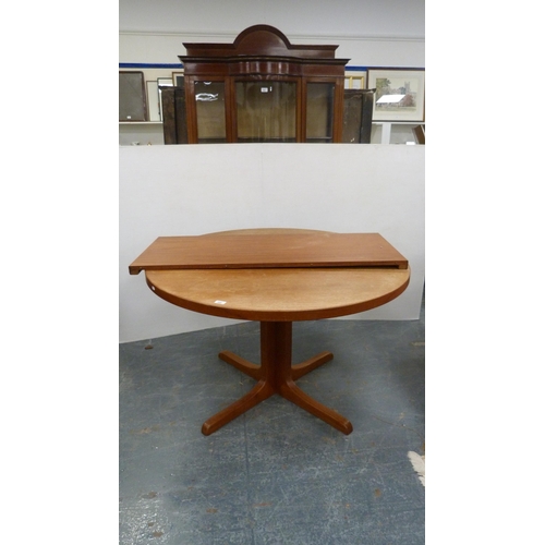 480 - Mid Century teak extending dining table with additional leaf, in the manner of Nils Jonsson of Swede... 