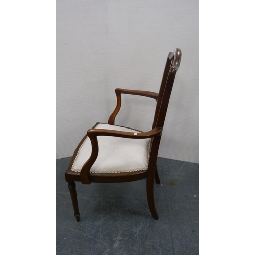 483 - Antique mahogany inlaid armchair with pierced splat back, on turned supports.