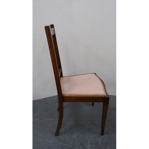 485 - Mahogany and crossbanded side chair with pierced fretwork splat, on square tapering supports.