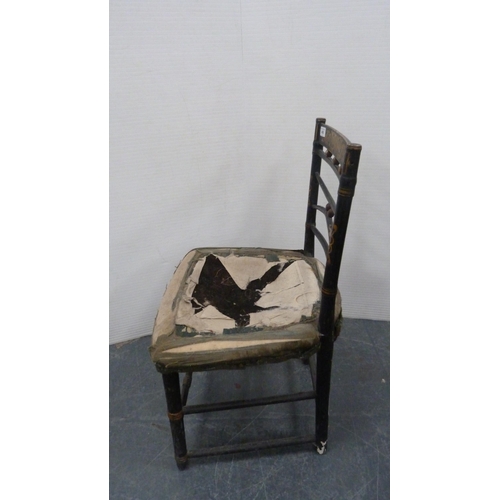 486 - Antique ebonised parlour chair with gilt-painted decoration, on turned supports.