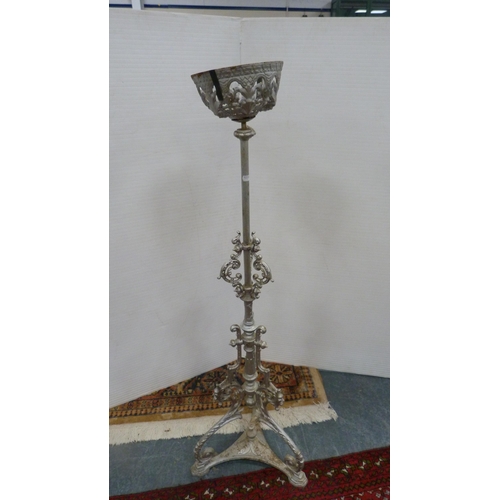 488 - Wrought iron silver-coloured candle holder, 110cm high.