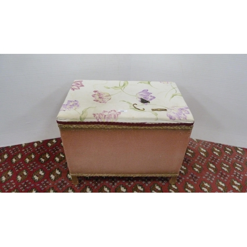 490 - Lloyd Loom-style pink wicker storage box with padded top.