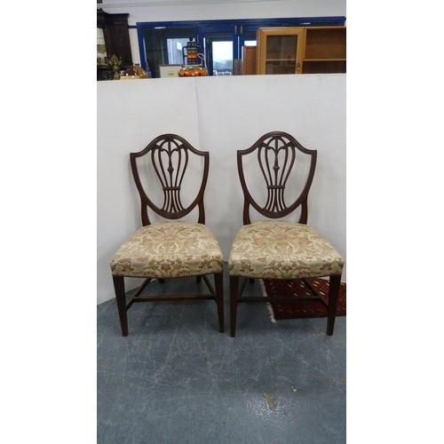 492 - Pair of 19th century mahogany shield-back dining chairs, on square tapering supports.  (2)