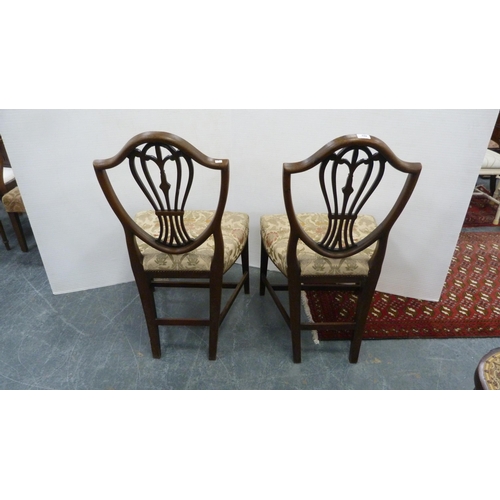 492 - Pair of 19th century mahogany shield-back dining chairs, on square tapering supports.  (2)