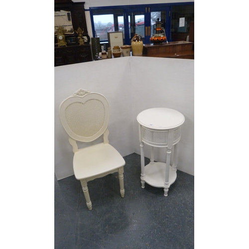 495 - Cream-painted bergère side table, on turned supports with understage, and a similar side chair.  (2)