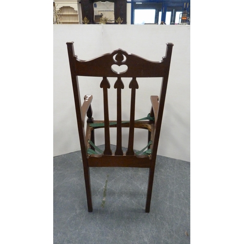 496 - Art Nouveau oak-framed carver armchair with heart-shaped pierced top rail and tulip spars, on square... 