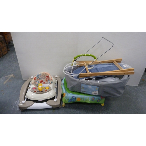 498 - Child's bouncer chair, baby walker, mini trampoline and a Moses basket on stand.