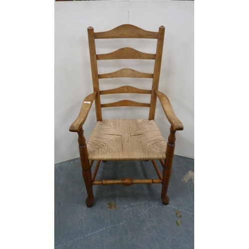 501 - Ash and elm ladder-back carver chair, c. early 20th century, with woven seat, on turned supports and... 