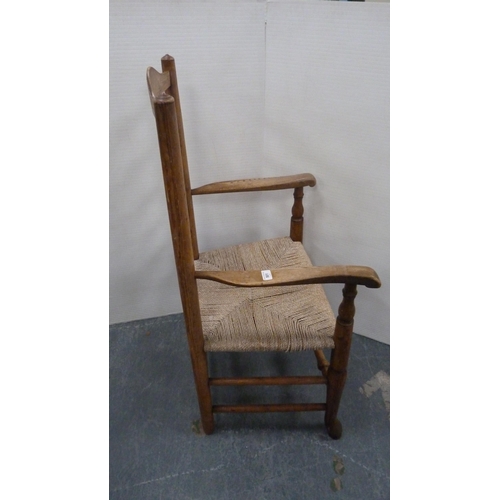 501 - Ash and elm ladder-back carver chair, c. early 20th century, with woven seat, on turned supports and... 