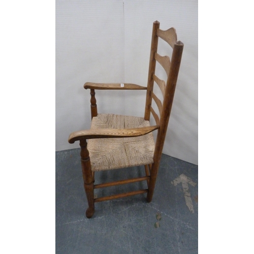 501 - Ash and elm ladder-back carver chair, c. early 20th century, with woven seat, on turned supports and... 