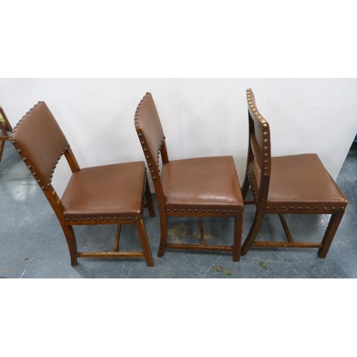 502 - Near-set of thirty oak English dining chairs, c. 1950s, with studded upholstery, stamped to the unde... 