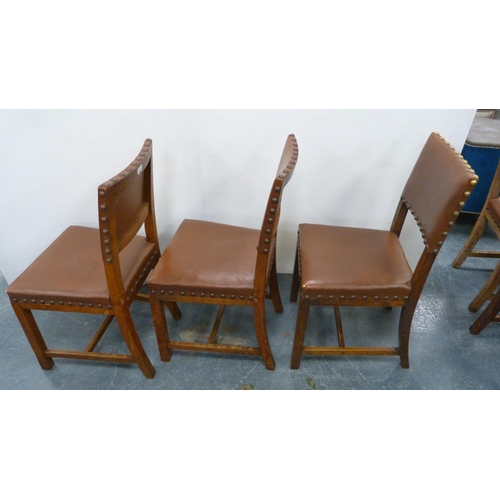 502 - Near-set of thirty oak English dining chairs, c. 1950s, with studded upholstery, stamped to the unde... 