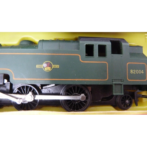 54 - Boxed Tri-ang OO gauge R59 tank loco, another boxed Tri-ang loco, four loose locos, tender and two c... 