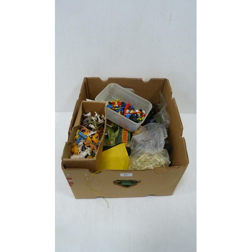 63 - Carton containing model railway parts and accessories to include buildings, figures, animals, also a... 