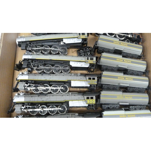 64 - Carton containing OO gauge 48151 loco and tender, various Bachmann locos and others.