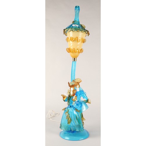 38 - Murano style coloured glass table lamp in the form of two carnival figures with two associated glass... 