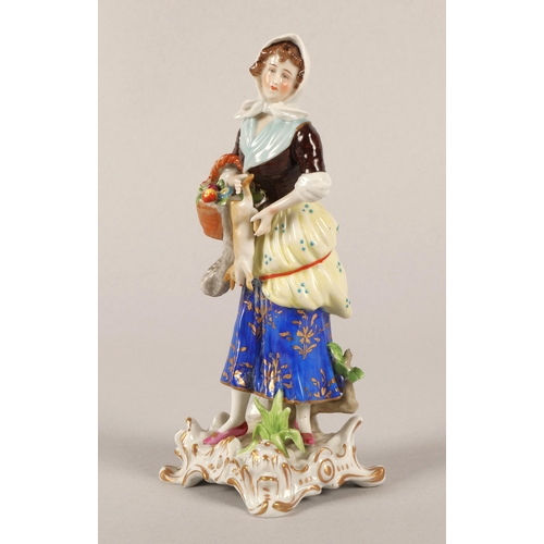 20 - Continental hand painted figurine of a peasant woman