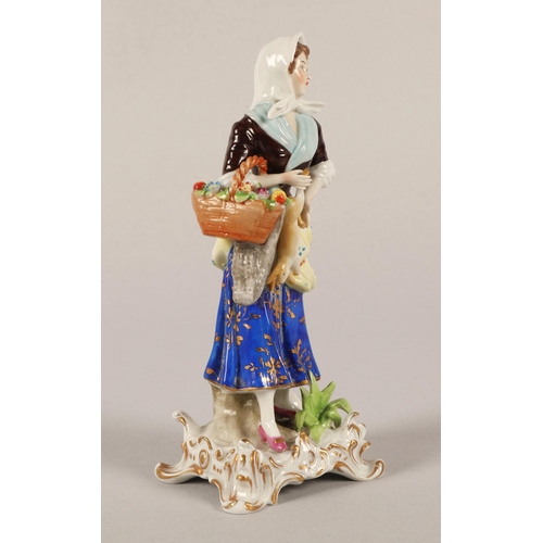 20 - Continental hand painted figurine of a peasant woman