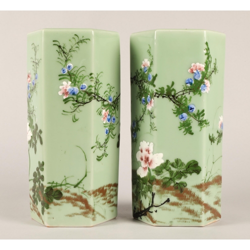 44 - Pair of famille vert six-sided floral vases 30cm h