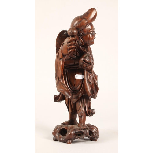 46 - Oriental carved root wood figure, 37cm h