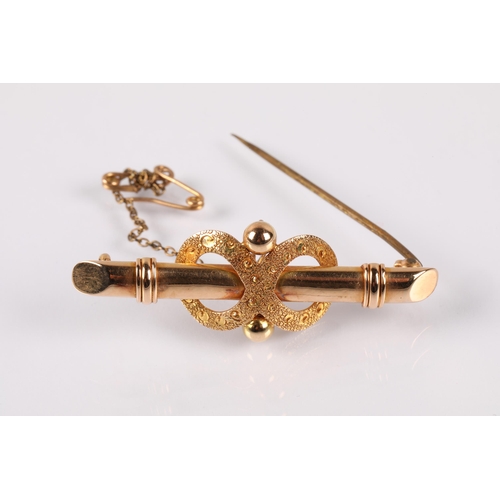 59 - 9ct gold mourning brooch set with pink gemstones and a diamond chip (1.5g) and a 15ct gold brooch (3... 