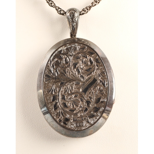 62 - Large hallmarked silver locket on chain, 31.9g