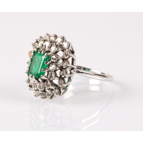 66 - Emerald Diamond cluster ring on white metal shank, ring size M