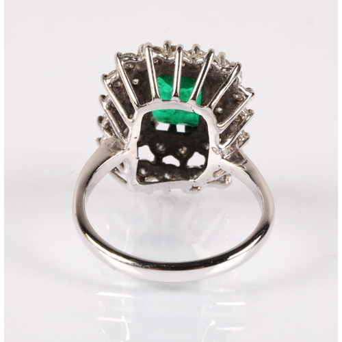 66 - Emerald Diamond cluster ring on white metal shank, ring size M