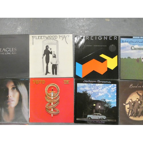 399 - Collection of mixed LPs to include Fleetwood Mac, Dire Straits Making Movies, Eagles The Long Run, R... 