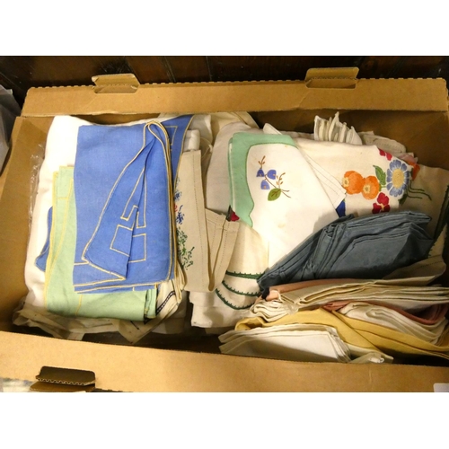 157 - Two boxes of vintage textiles including place mats, tablecloths etc.