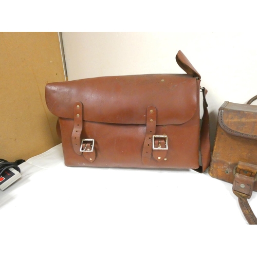 210 - Two antique leather bags.