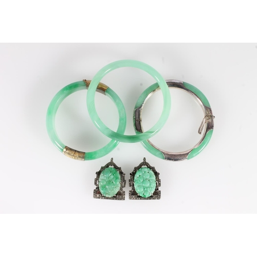 800 - Three Chinese jade bangles, maximum internal width 5.8cm, together with a Chinese jade and marcasite... 